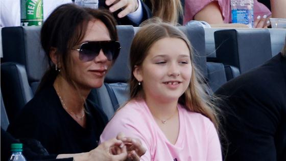 Victoria Beckham and daughter Harper pose in tennis outfits before enjoying  a sunset sail with Cruz