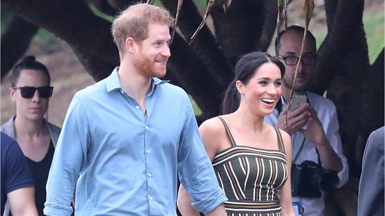 Britain’s Harry scales Sydney Harbour Bridge, joins group hug at Bondi