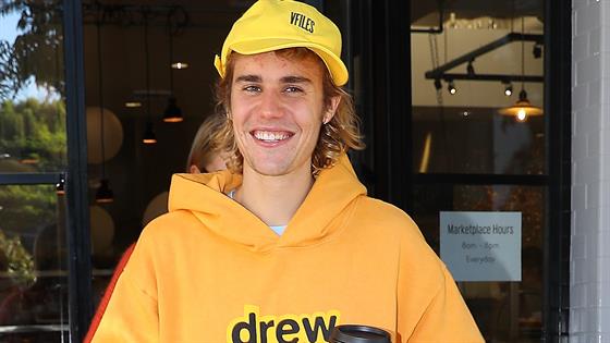 Justin Bieber Steps Out With a Man Bun - E! Online