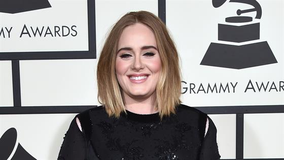 Adele wows in double denim and heels for date night at basketball game